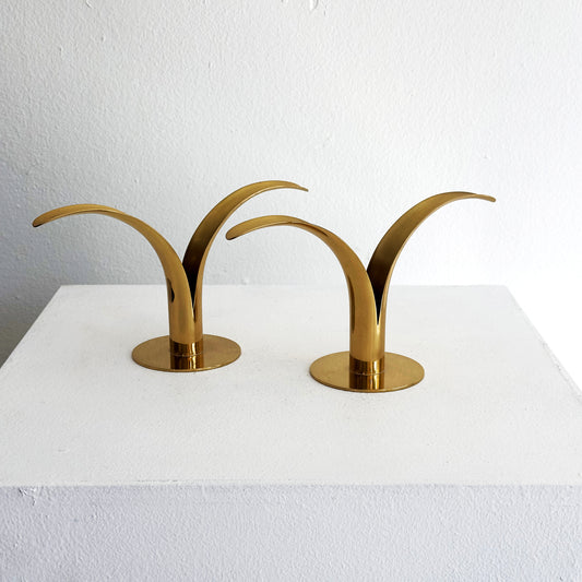 Pair of Sweden-lily candleholders.